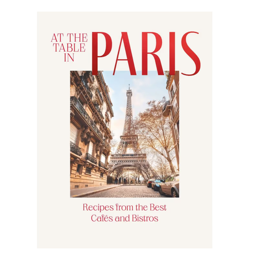 At the Table in Paris cookbook cover showcasing the Eiffel Tower, featuring Paris cookbook French recipes.